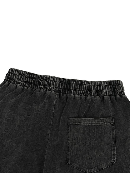 Spodnie bawełniane ze ściągaczem Snow Wash